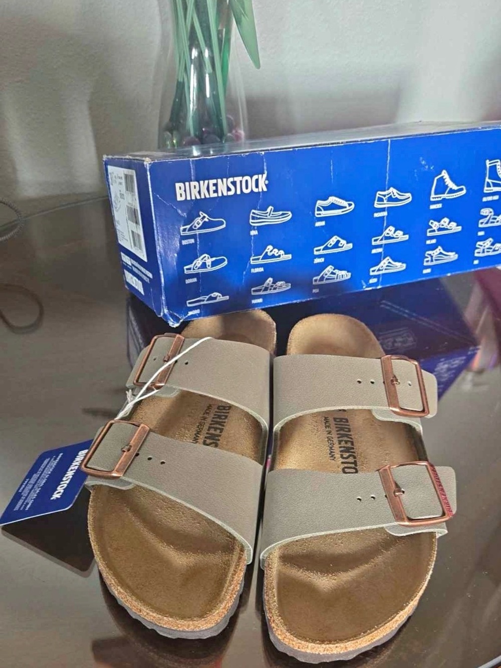Birkenstock women’s Arizona Sandals in Taupe with Rose-Gold Buckles